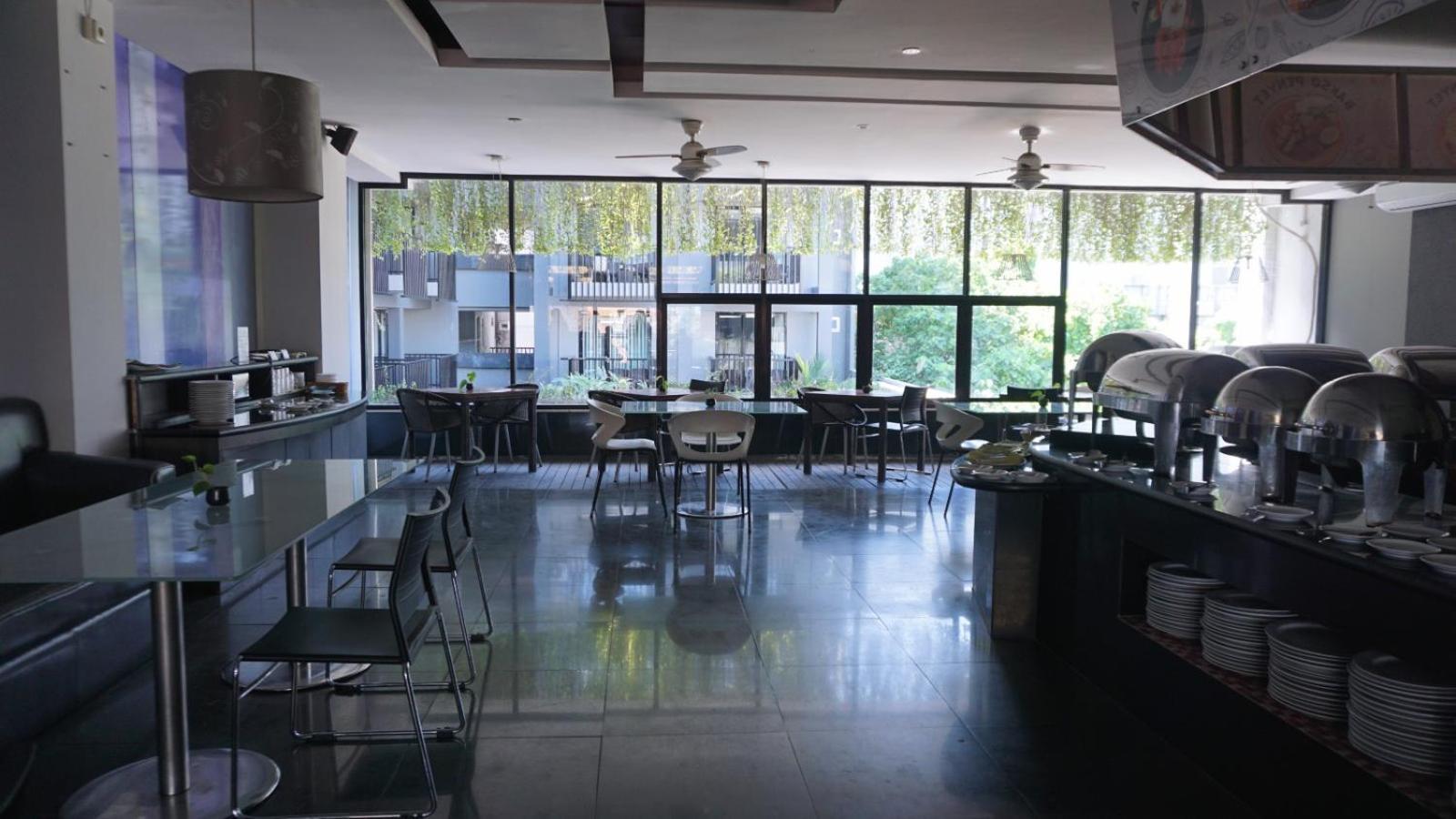 Legian Conjioo Hotel Kuta Managed By Mhm מראה חיצוני תמונה